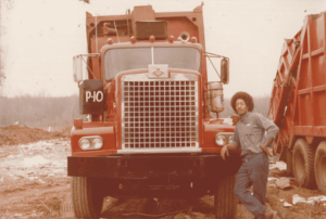 A Taylor with his rear load truck